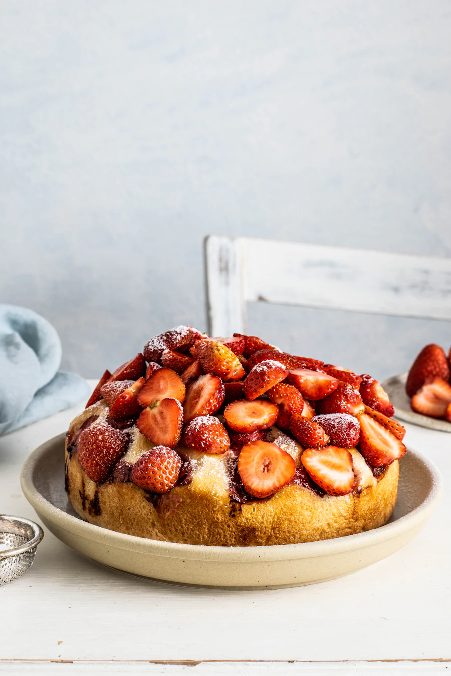 Close-up of strawberry blush cake with fresh berries
