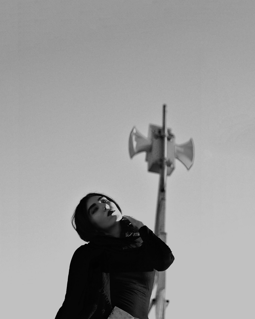 woman standing near tower