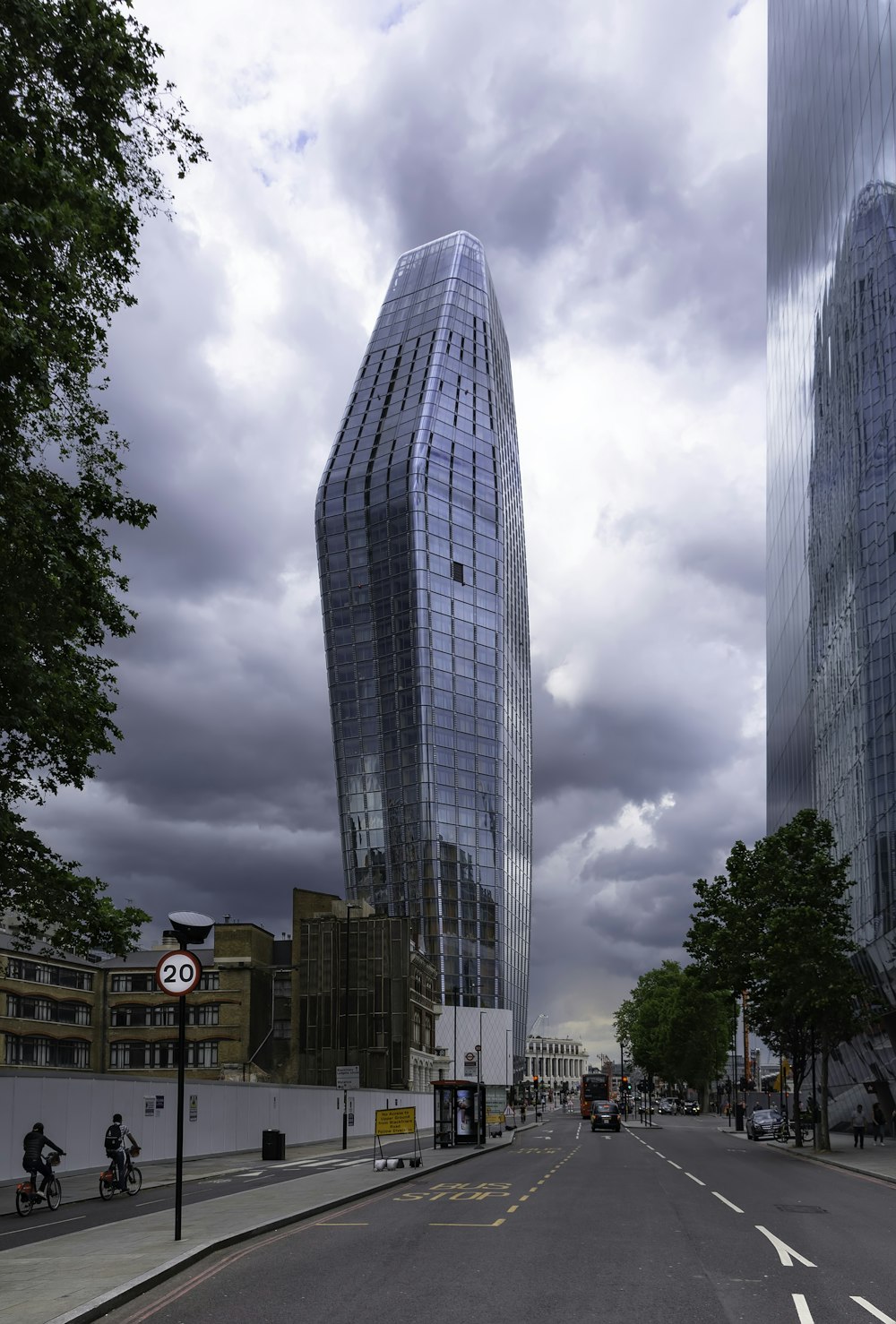 low angle photo of curtain glass wall building