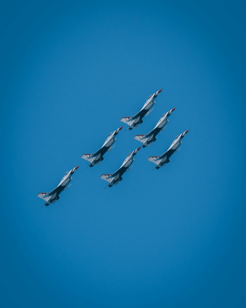 six gray-and-black jet planes