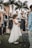 A young girl in a beautiful dress celebrating her quinceañera with friends.