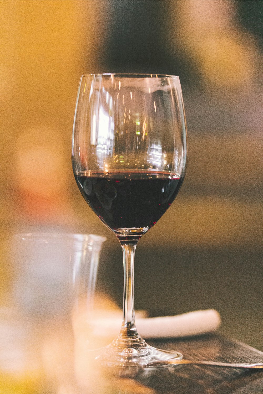 black liquid-filled wine glass