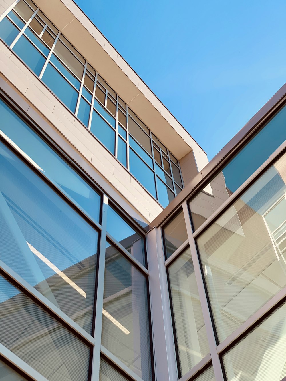 low-angle photography of multi-storey building