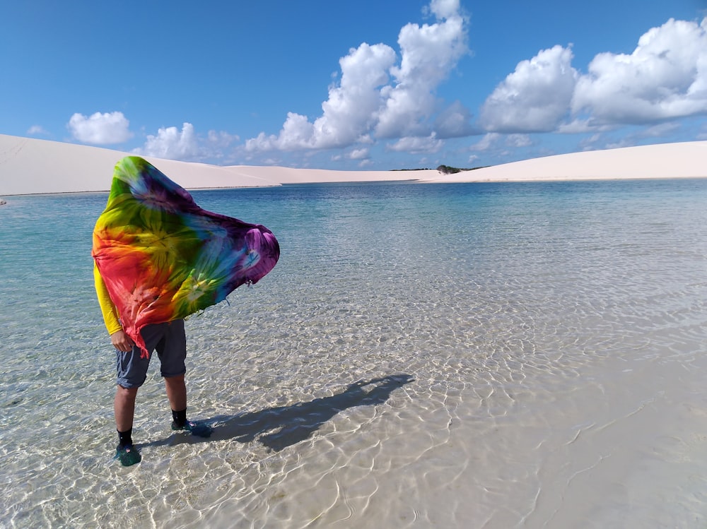 person standing in seashore