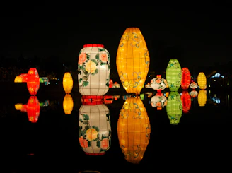 Colorful lanterns floating on the water during the Diwali festival of lights.
