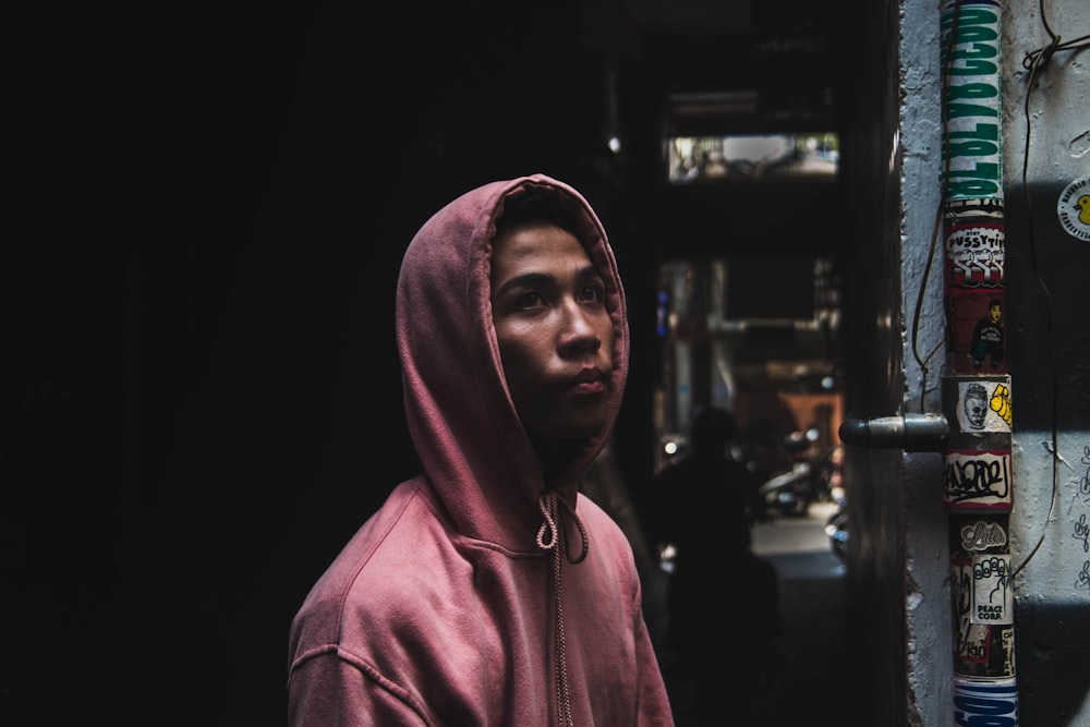 woman in pink hoodie