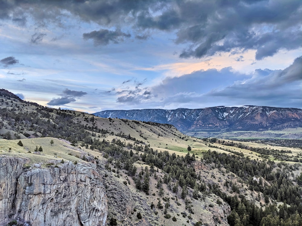 mountain under cloudy sky