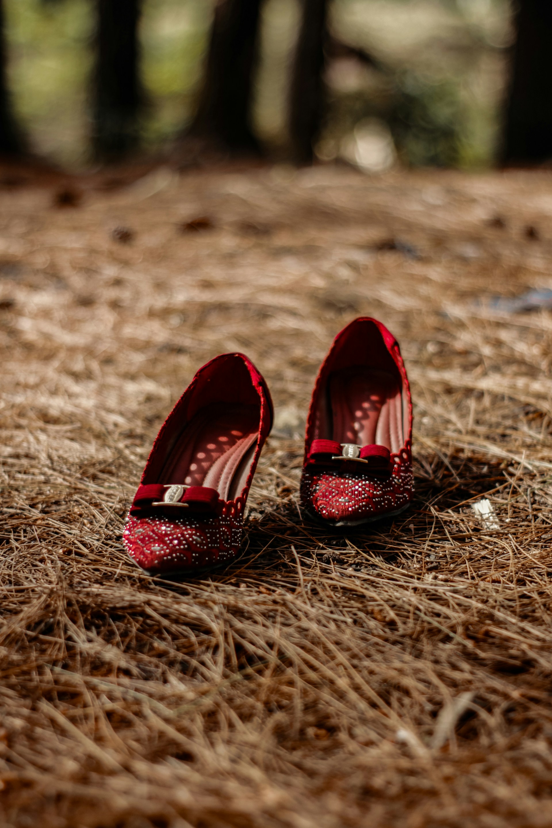 woman wearing yellow long-sleeved dress under white clouds and blue sky during daytime