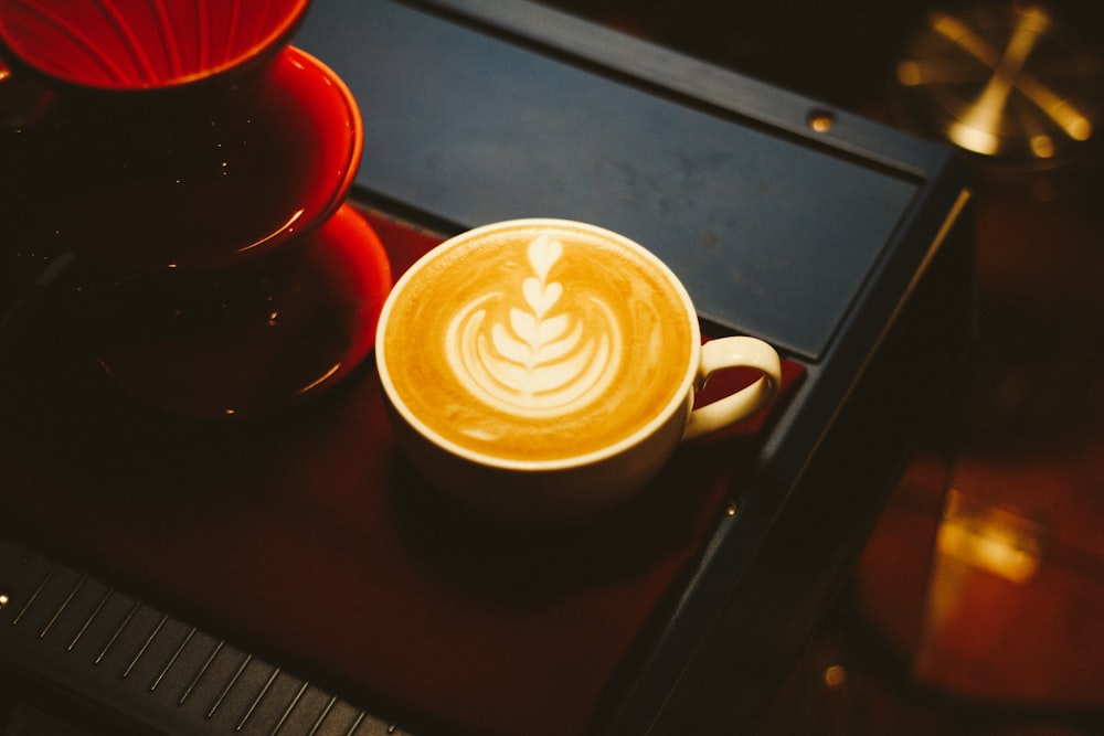 brown ceramic teacup