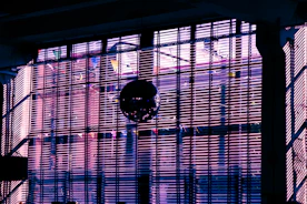 a clock that is on the side of a building