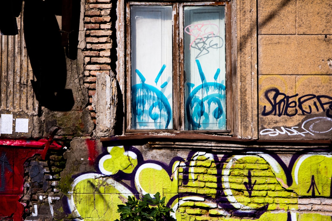 yellow all art, Old brick wall with colorful graffiti