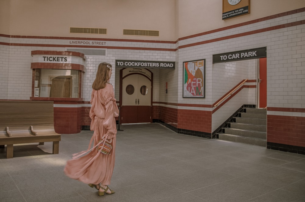 woman in pink dress