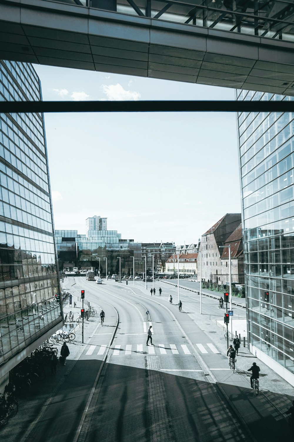 grayscale photography of people walking on road during daytime