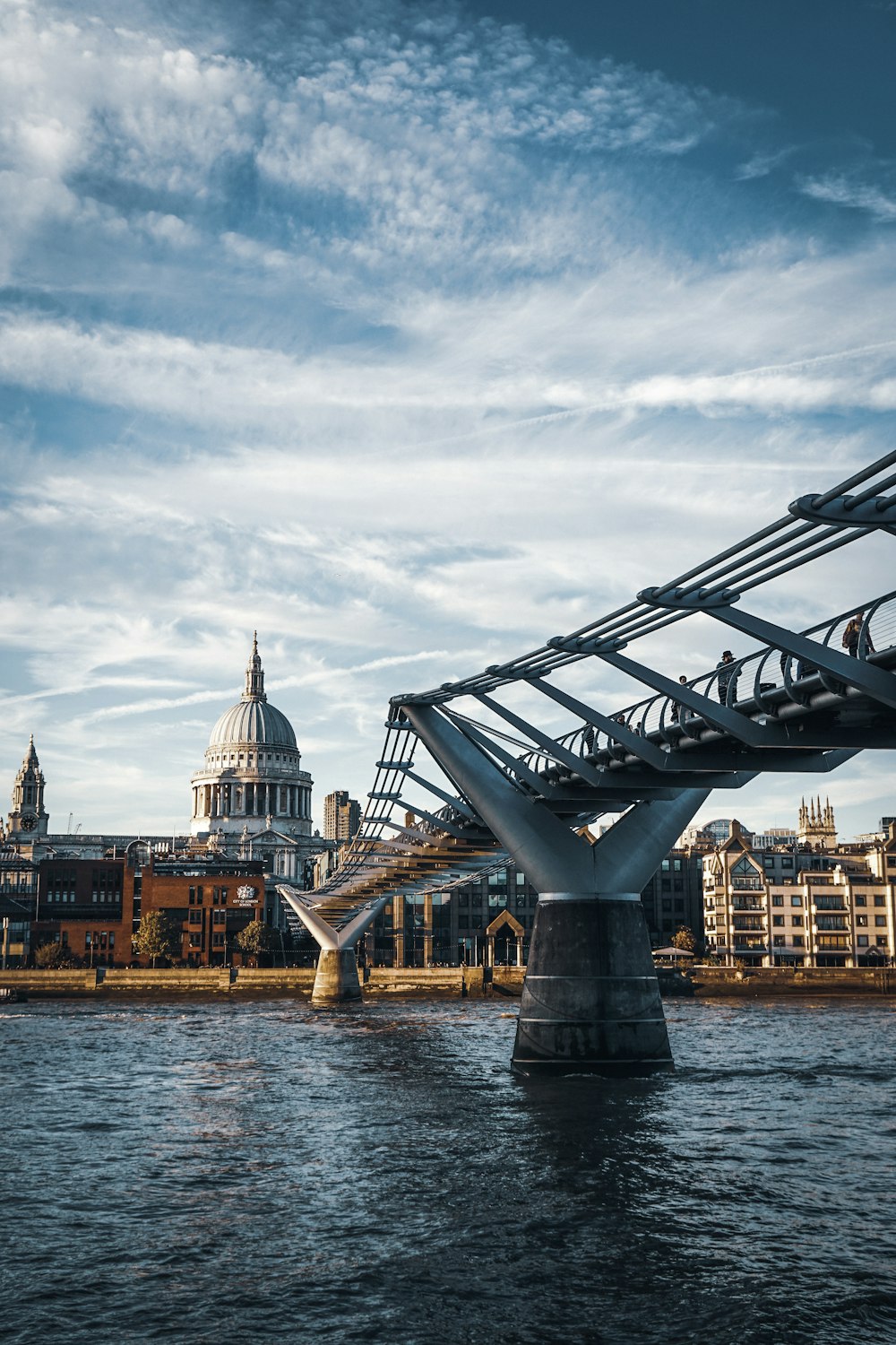 gray bridge on body of water photo