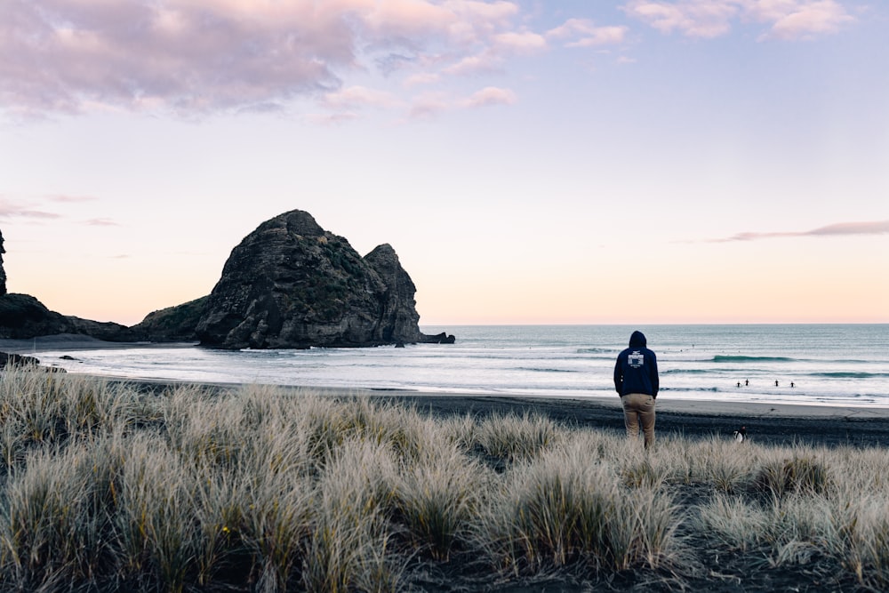 person standing on shore