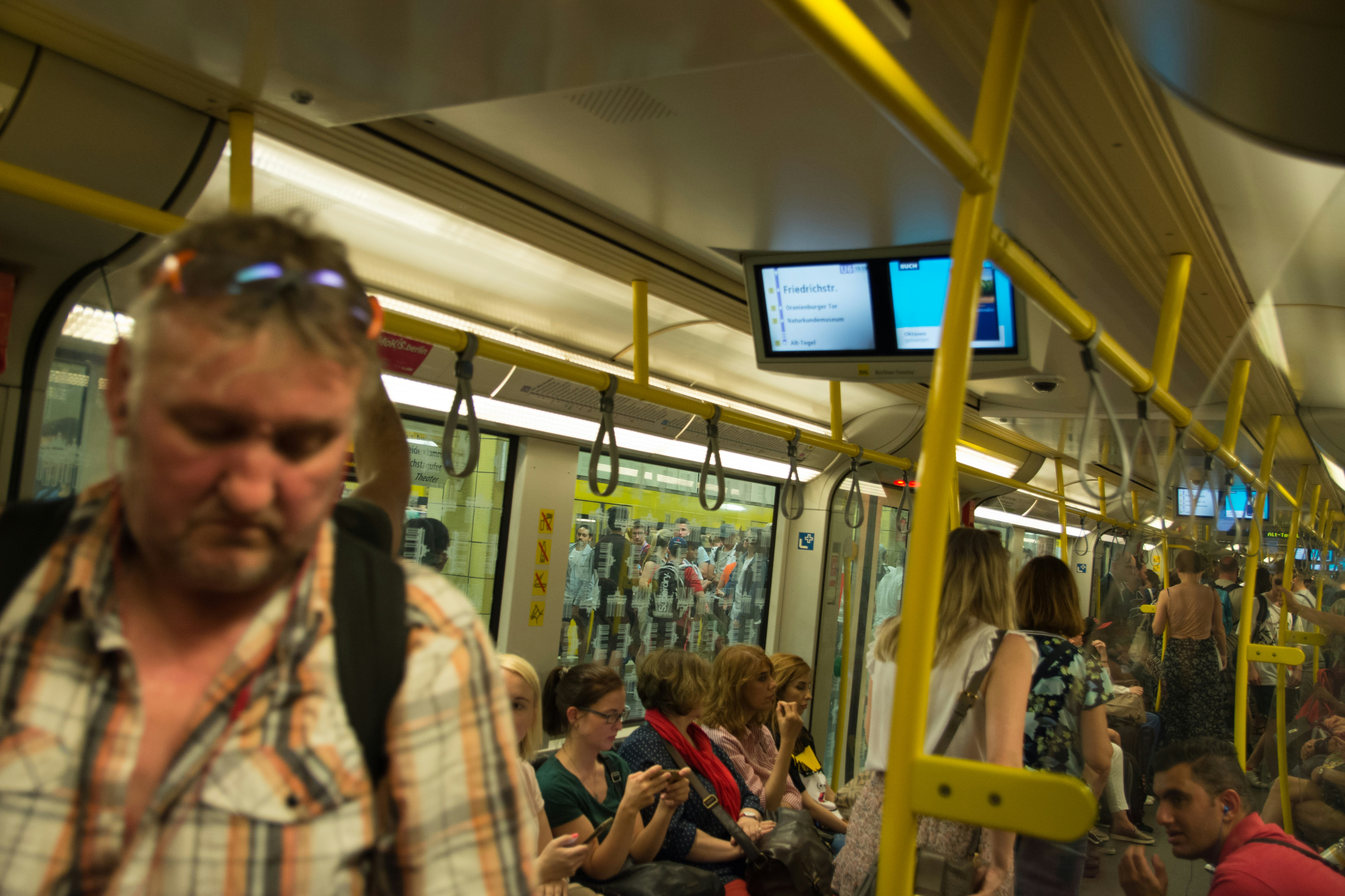 A person using a laptop to check bus and train schedules online