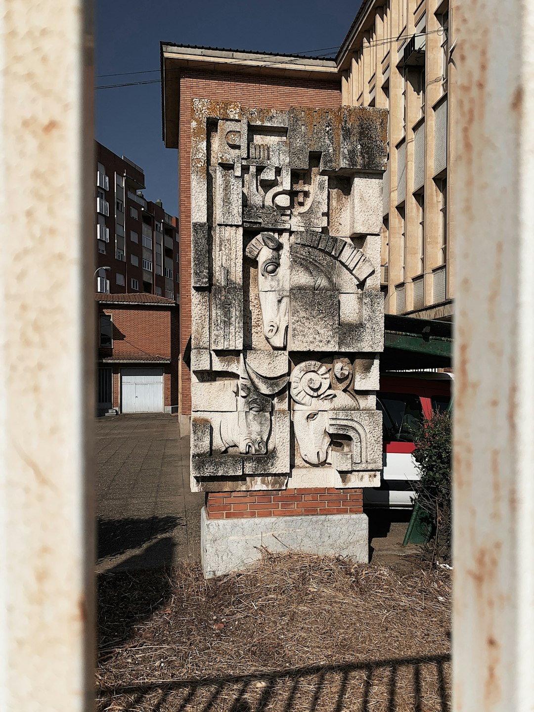 gray and brown concrete buildings under blue sky