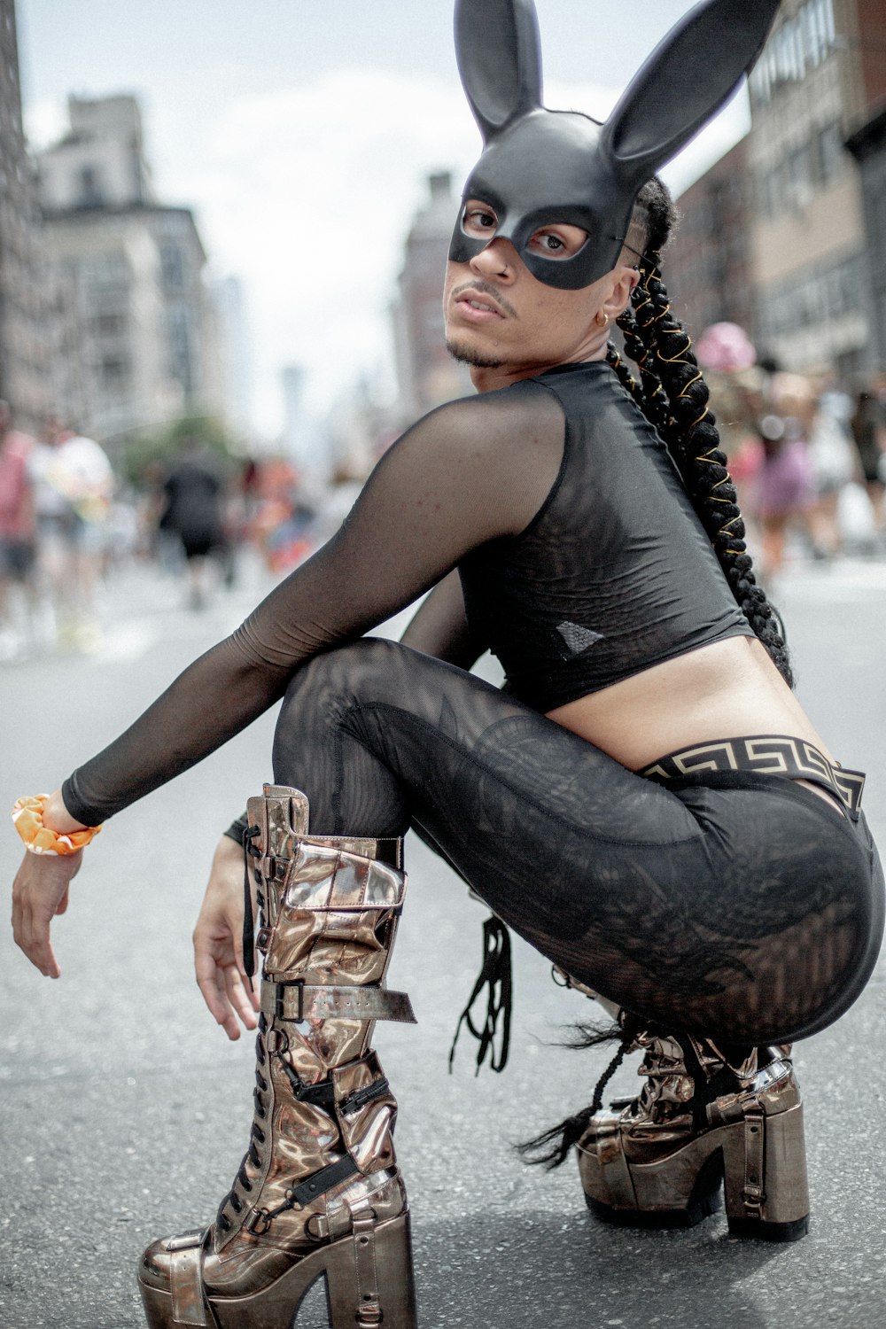 woman wearing cat costume sitting and glancing her left side