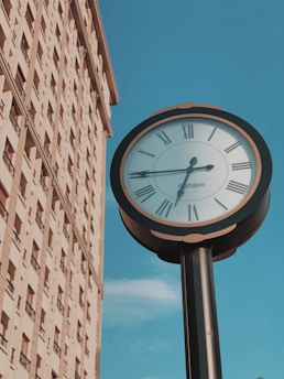 black pedestal clock