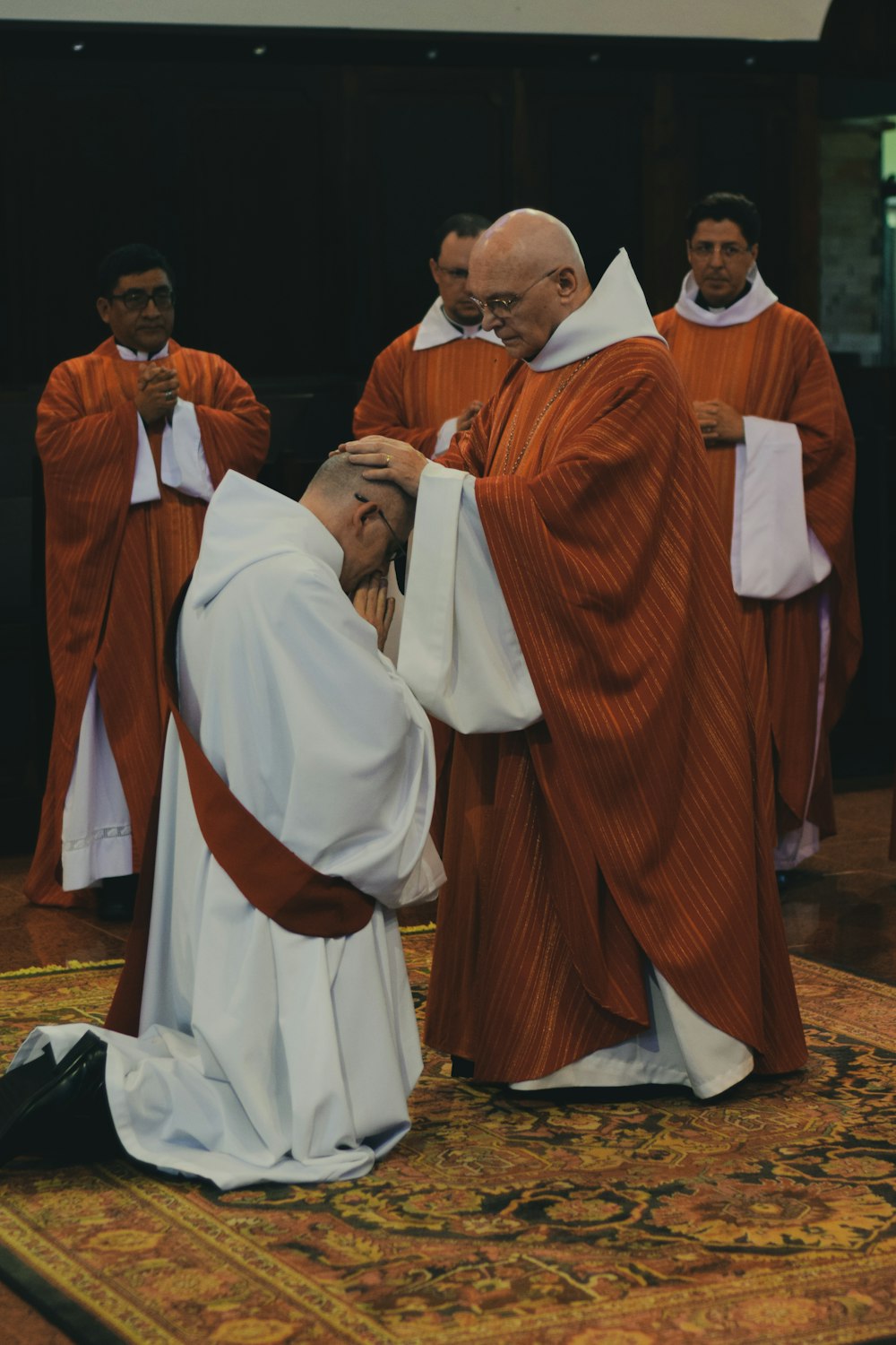 five pastor in church close-up photography