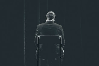 man sitting on chair