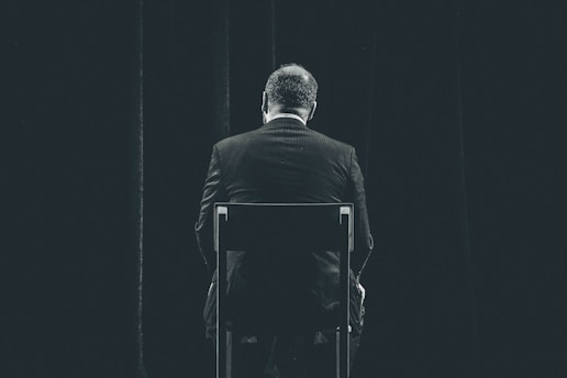 man sitting on chair