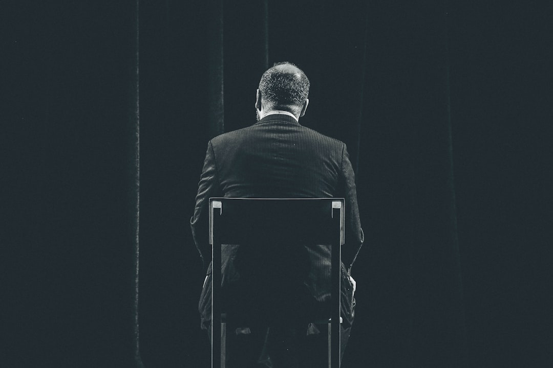 man sitting on chair