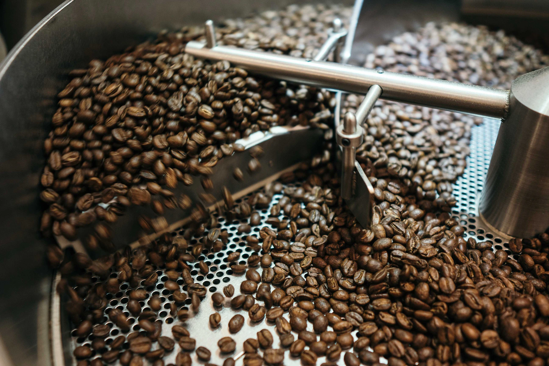 Sacks of green coffee beans at a roastery