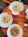 A vibrant, appetizing meal served on a wooden table, showcasing fresh ingredients and a cozy dining atmosphere.