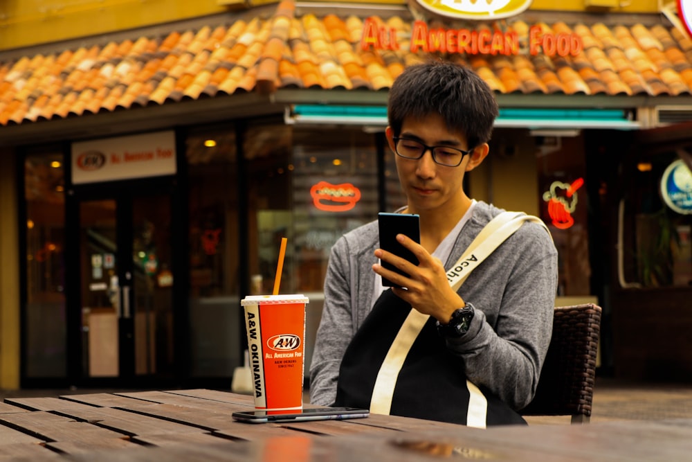 man sitting in front of table