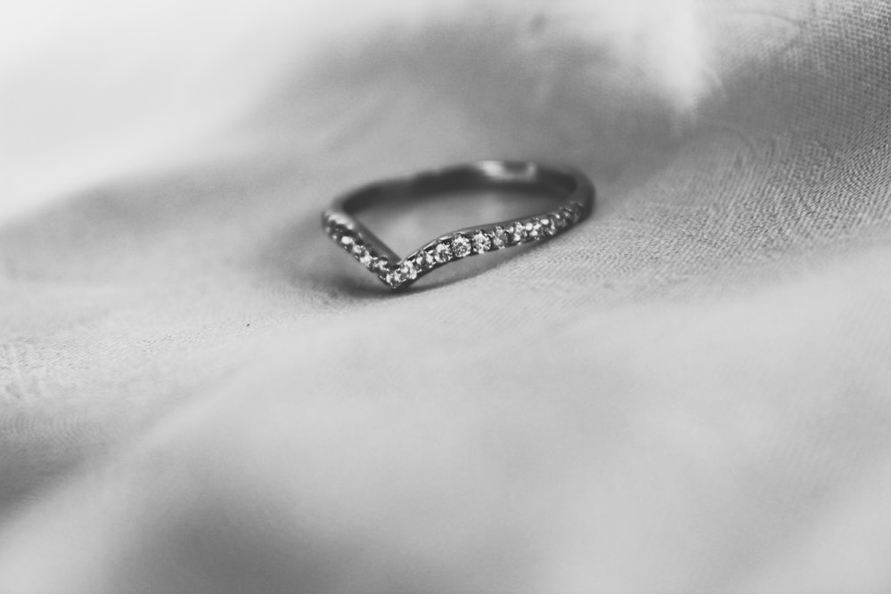 silver-colored and clear gemstone ring