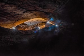 Texture of natural stone illuminated softly, highlighting its intricate patterns.