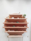 Sleek modular shelving unit with decorative items