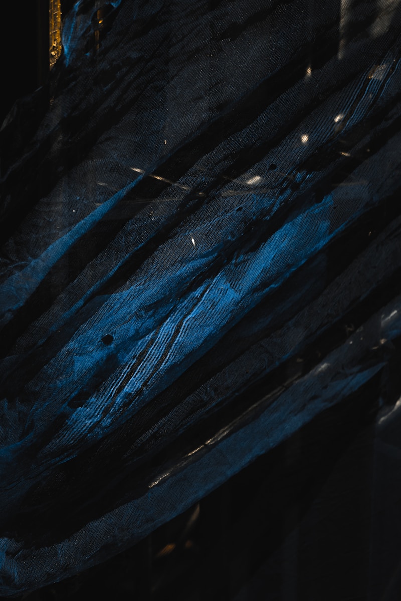 Digital artist creating abstract art on tablet with stylus