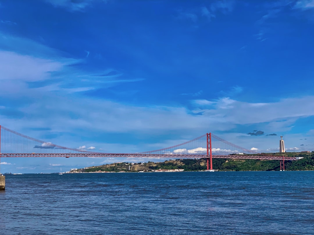 Suspension bridge photo spot R. de Belém 4 MAAT