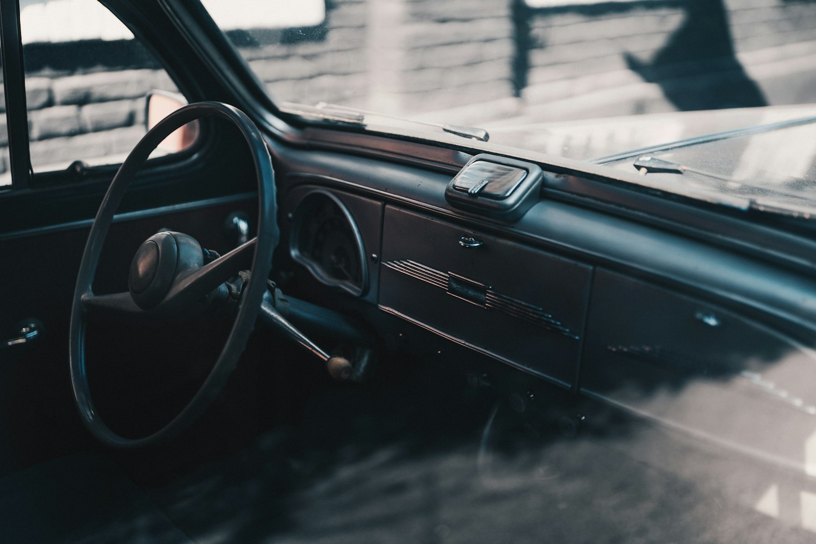 Sony a7 III + Sigma 40mm F1.4 DG HSM Art sample photo. Black vehicle steering wheel photography