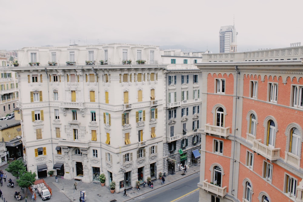 white and pink concrete buildings during daytime