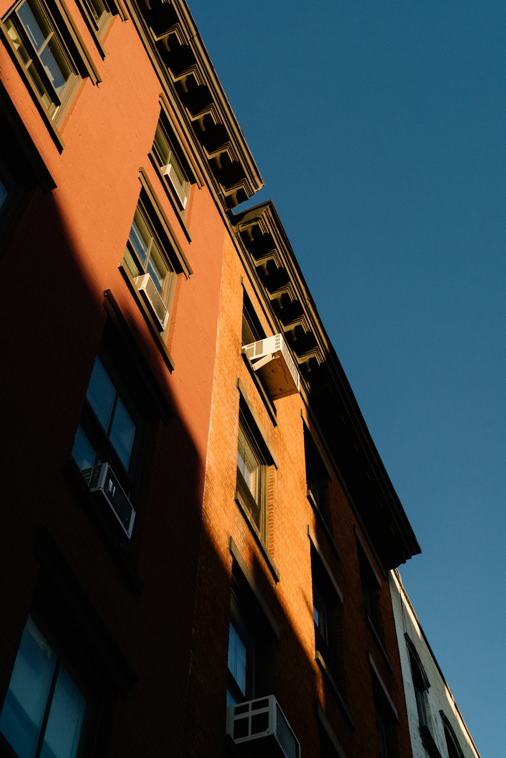 worm view photo of brown building