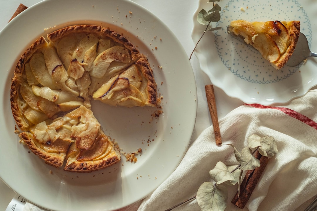 An apple pie with a slice taken out