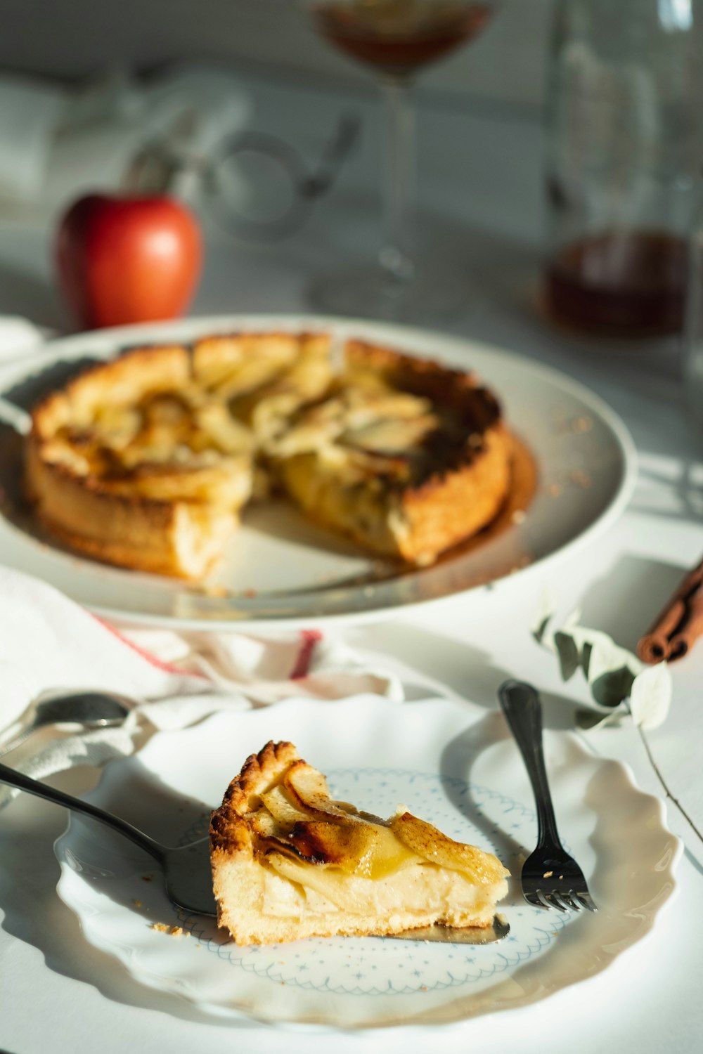 shallow focus photo of sliced desert on white ceramic plate