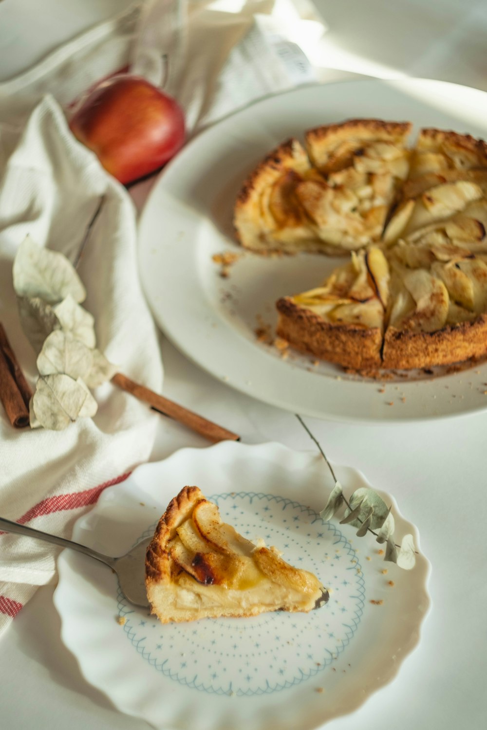 sliced fruit pie on plate