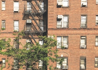 brown concrete high-rise building