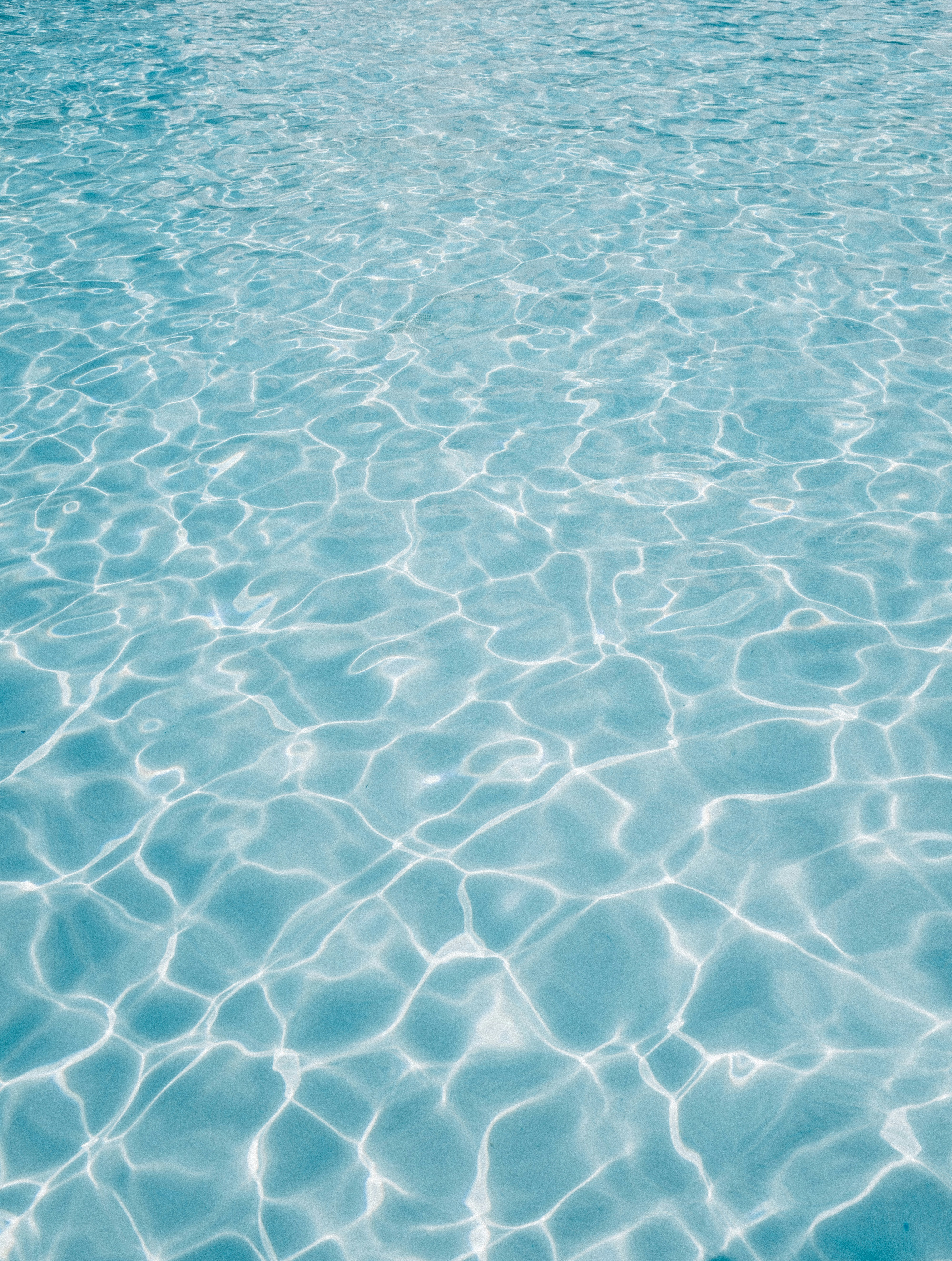 What Are The Considerations For Installing A Backyard Swimming Pool?