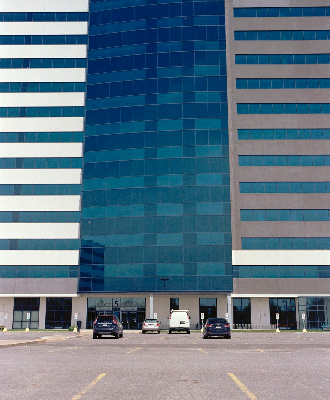 cars in front of building