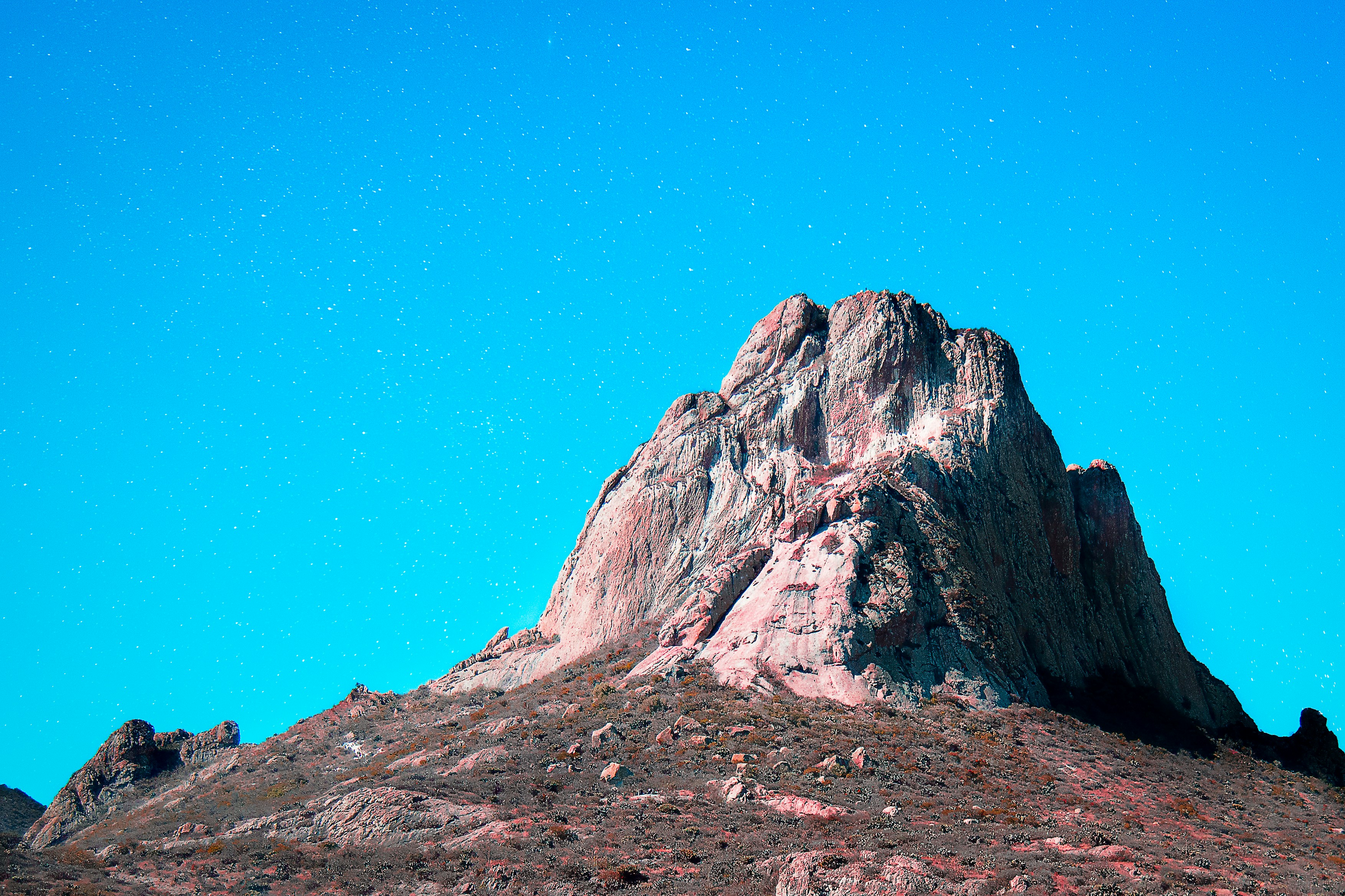 rock formation under blue sky