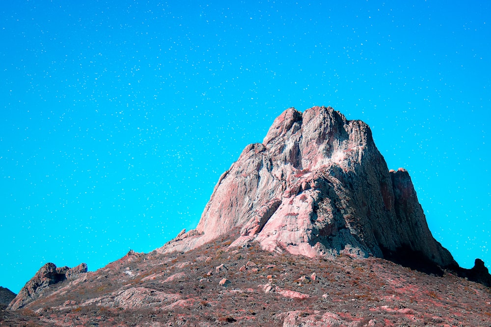 rock formation under blue sky