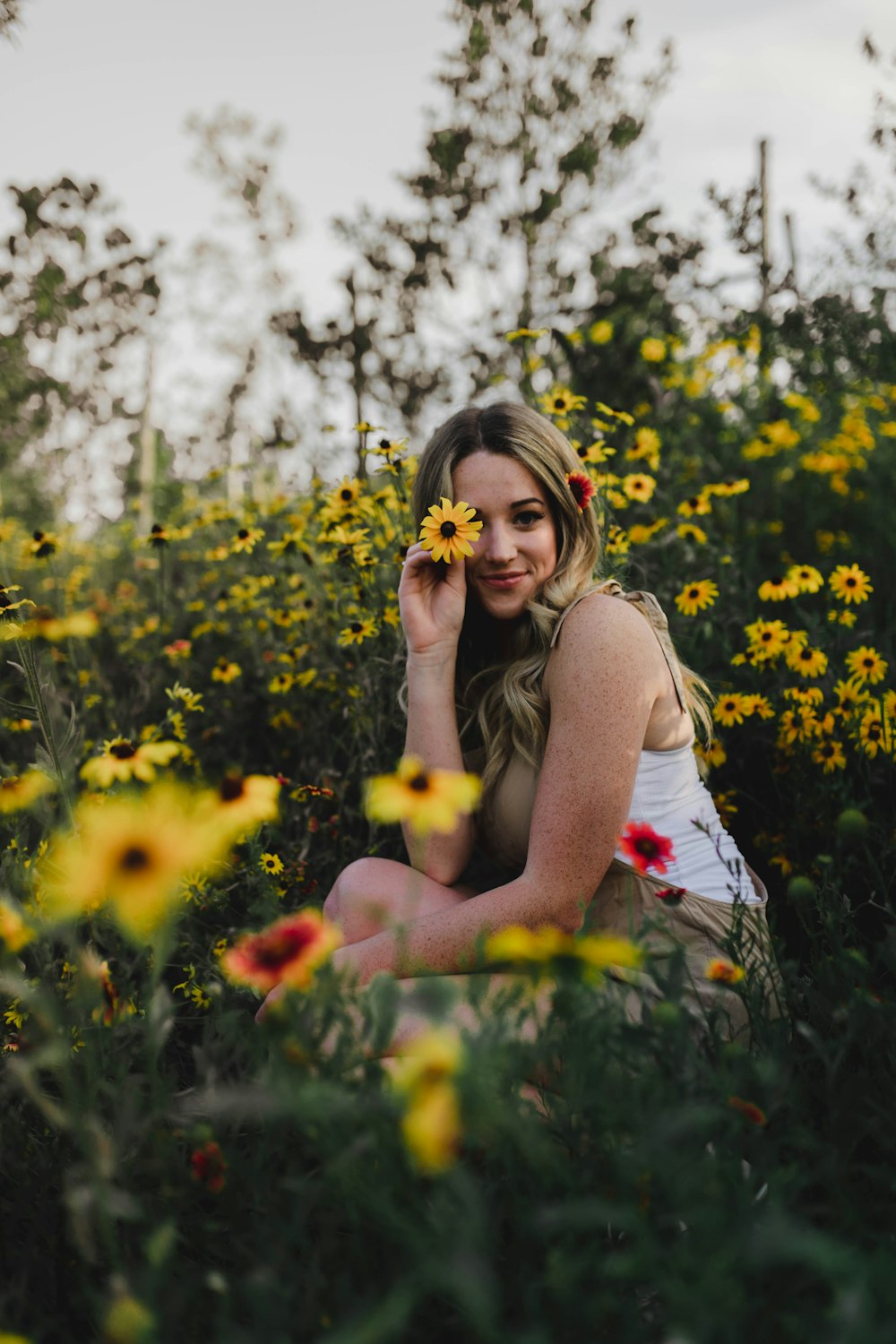 woman near flower field