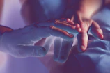 A serene scene of a gentle hand reaching out in forgiveness.