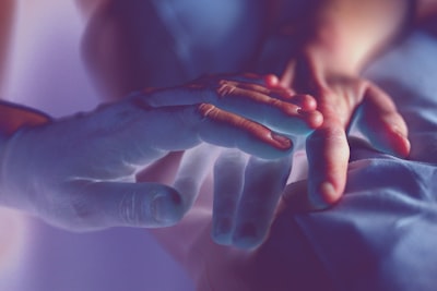 person's hands touching google meet background