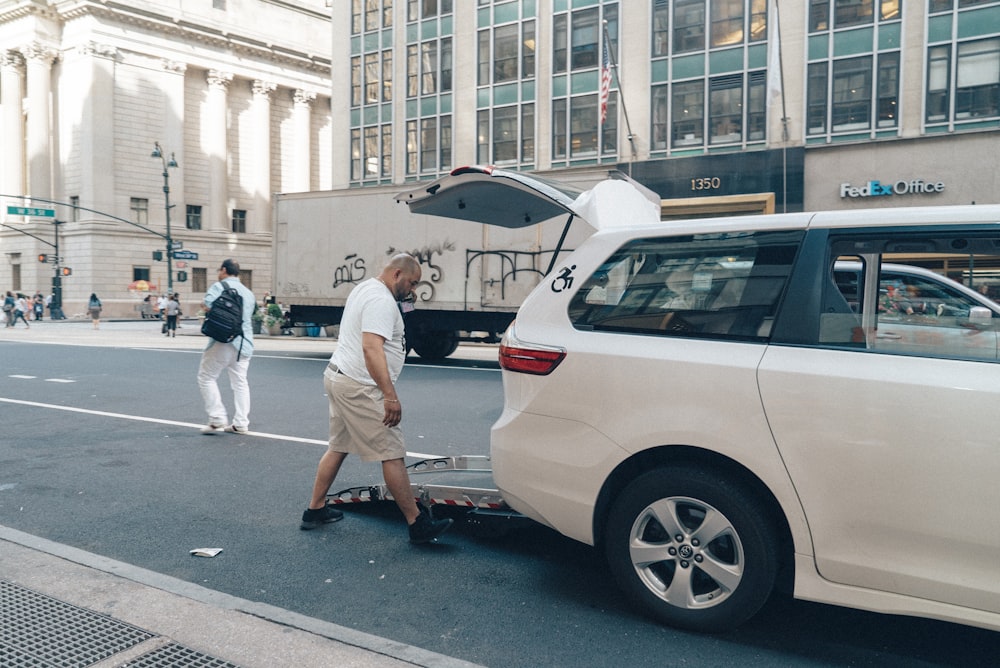 man behind SUV